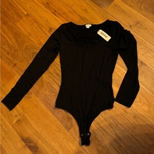 NWT Garage long sleeve straps crisscross front body suit, sz XS.